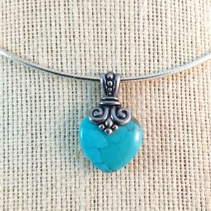 Turquoise heart pendant capped in 925 sterling silver